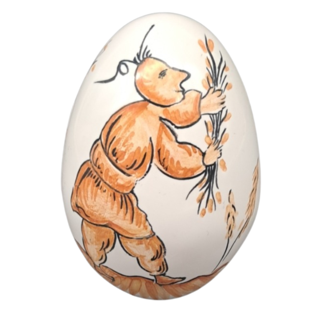 Egg with Moustiers Grotesque monochrome hand painted decoration in orange