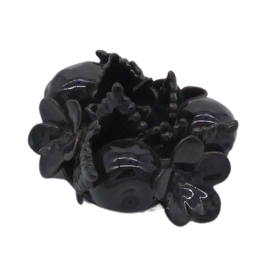 Fruit candle holder in black glaze side view