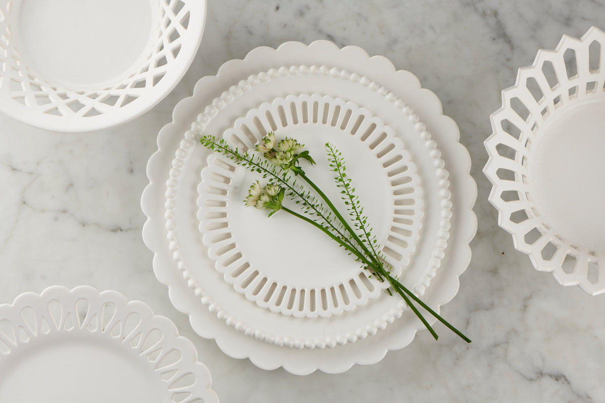 Handmade faience plates by Bourg-Joly Malicorne