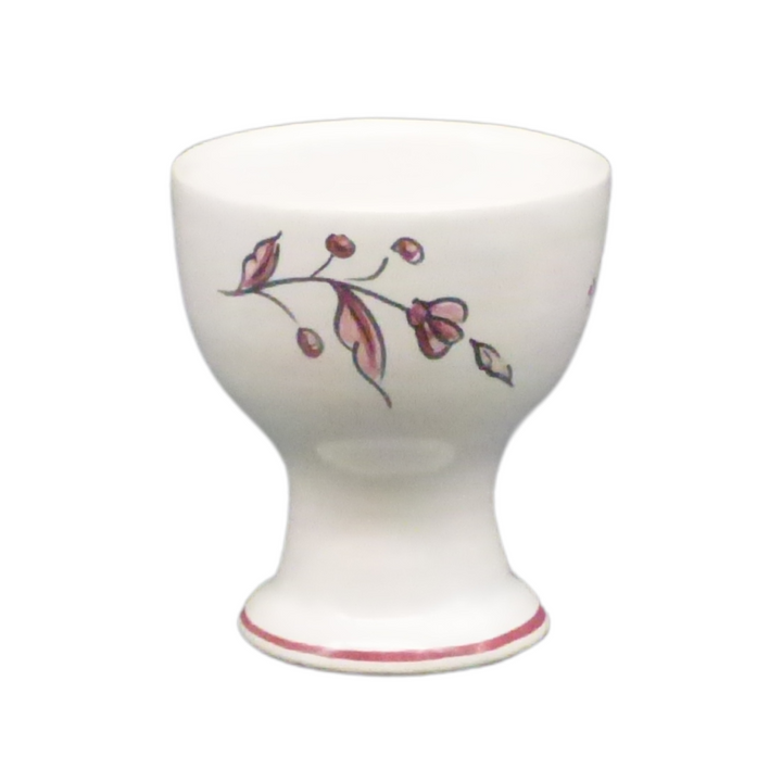 Simple egg cup with a raspberry hand painted flower