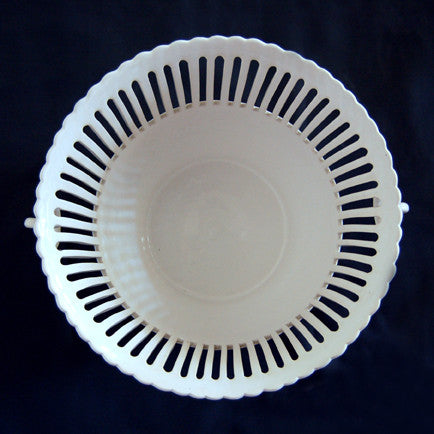 Openwork ceramic planter with handles top view