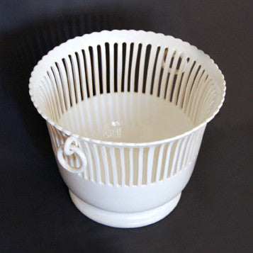 Openwork ceramic planter with handles