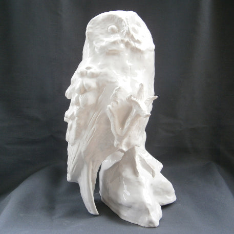 White Earthenware Owl with one claw raised